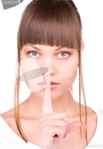 Image of finger on lips