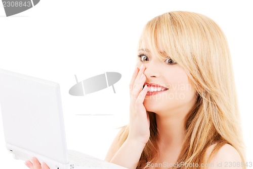 Image of teenage girl with laptop computer