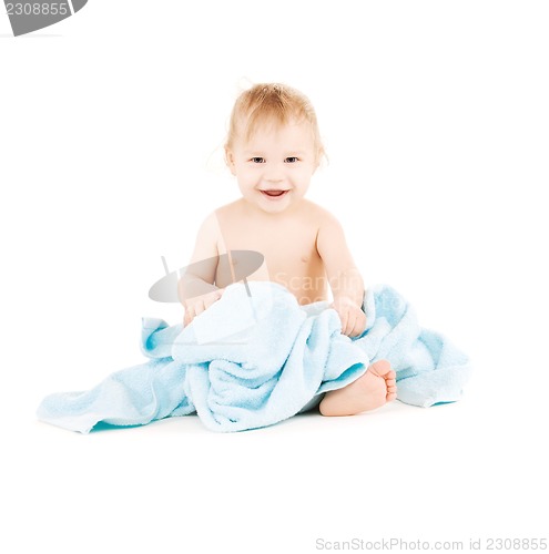 Image of baby with blue towel