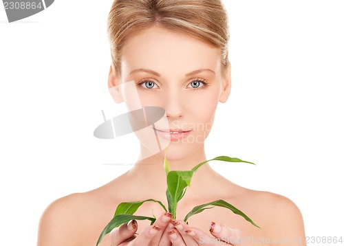 Image of woman with sprout