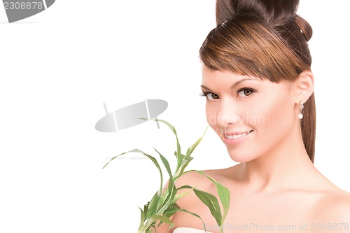 Image of woman with sprout