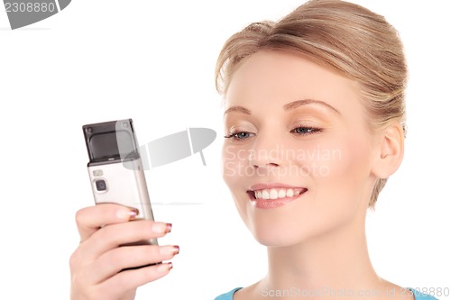Image of happy woman with cell phone