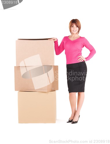 Image of businesswoman with boxes