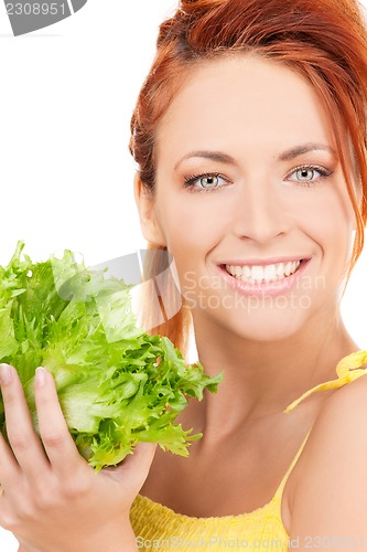 Image of happy woman with lettuce