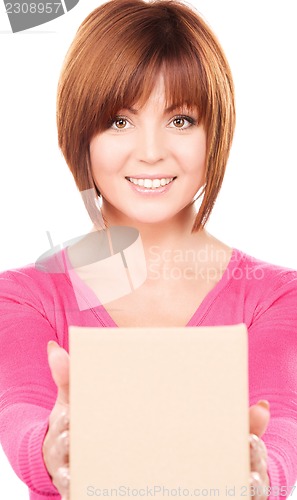 Image of businesswoman with parcel