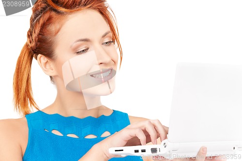 Image of happy woman with laptop computer