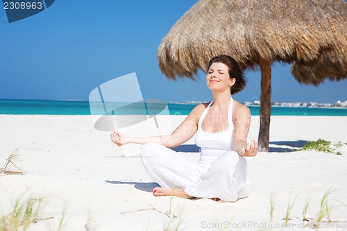 Image of meditation on the beach