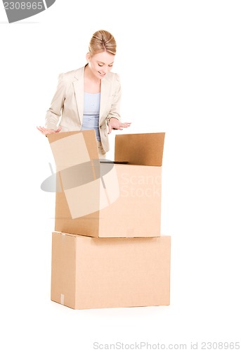 Image of businesswoman with boxes