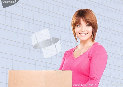 Image of businesswoman with parcel