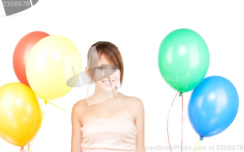 Image of happy teenage girl with balloons