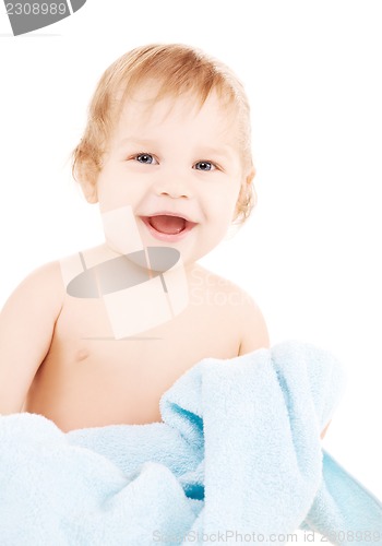 Image of baby with blue towel