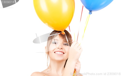 Image of happy teenage girl with balloons
