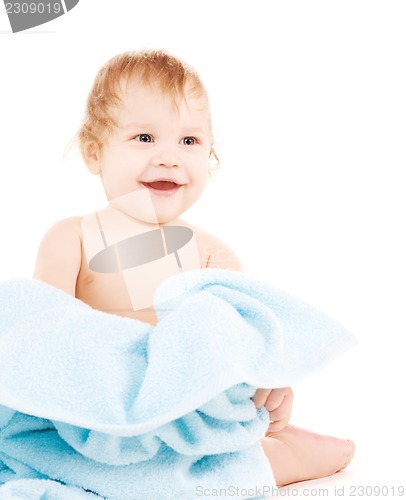 Image of baby with blue towel