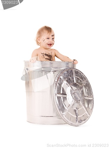 Image of baby in trash can