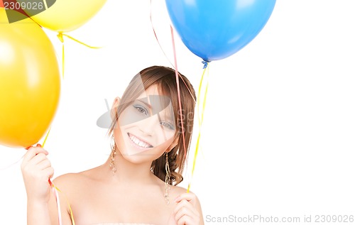 Image of happy teenage girl with balloons