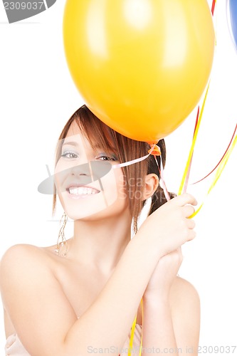 Image of happy teenage girl with balloons