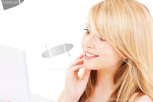 Image of teenage girl with laptop computer