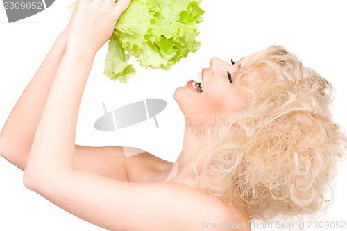 Image of happy woman with lettuce