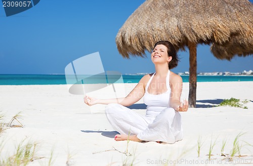 Image of meditation on the beach