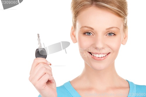 Image of happy woman with car key