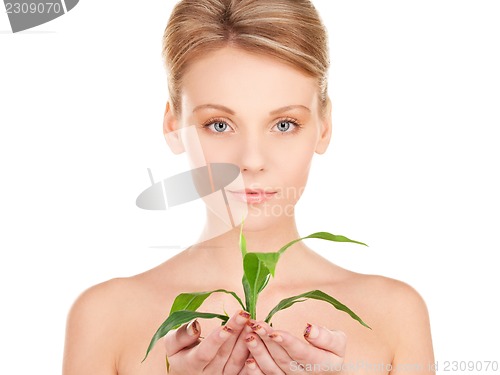 Image of woman with sprout