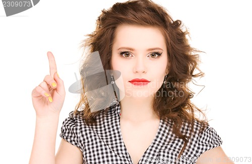 Image of teenage girl with her finger up