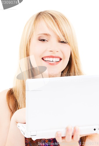 Image of teenage girl with laptop computer
