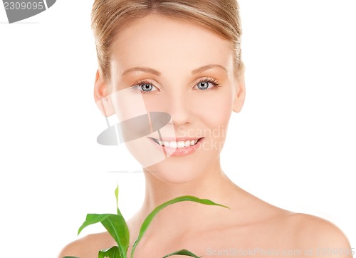 Image of woman with sprout