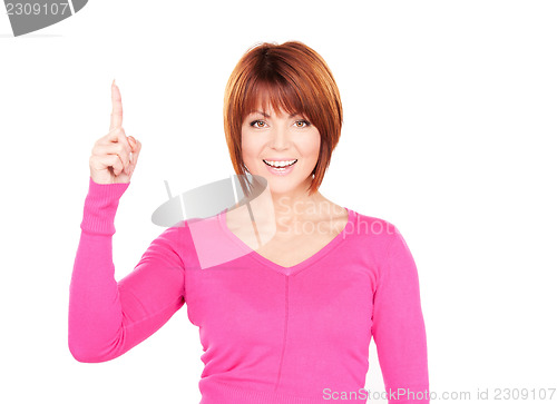 Image of attractive businesswoman with her finger up