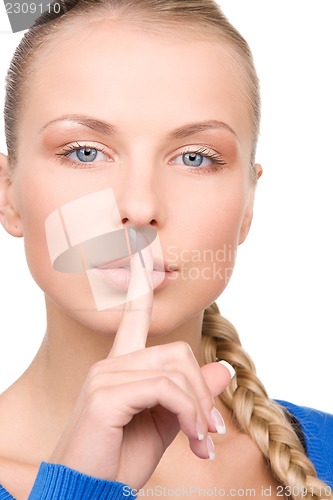 Image of finger on lips