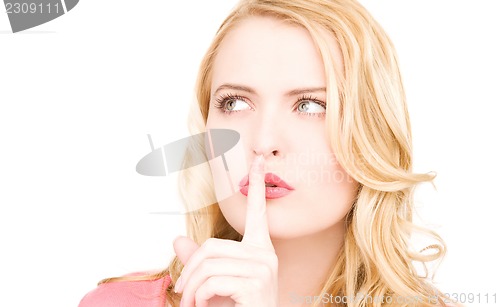 Image of finger on lips