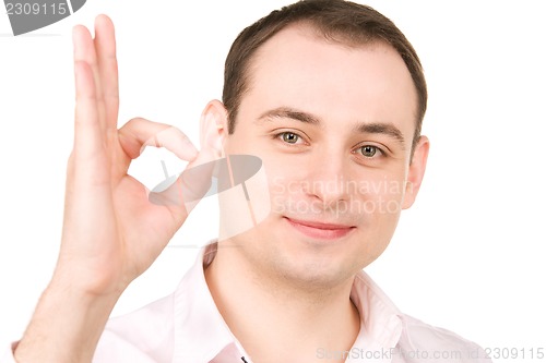 Image of businessman showing ok sign