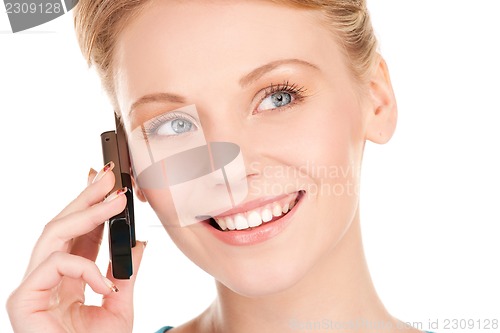 Image of happy businesswoman with phone