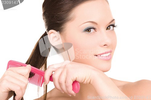 Image of woman with comb