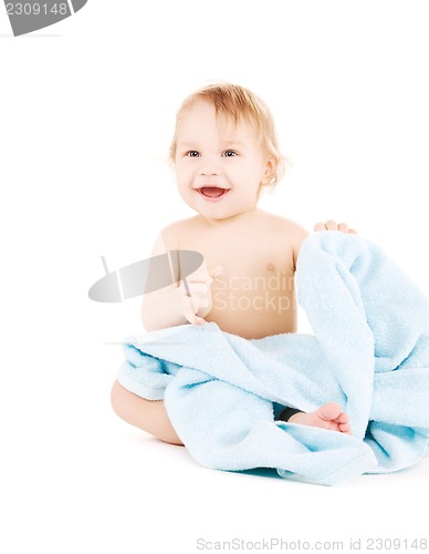 Image of baby with blue towel