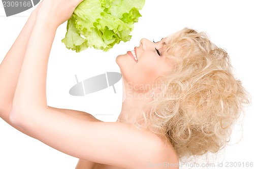 Image of happy woman with lettuce