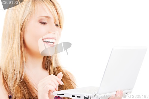 Image of teenage girl with laptop computer
