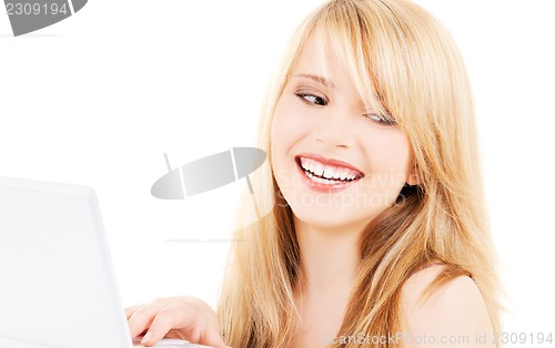 Image of teenage girl with laptop computer