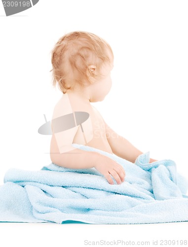 Image of baby with blue towel