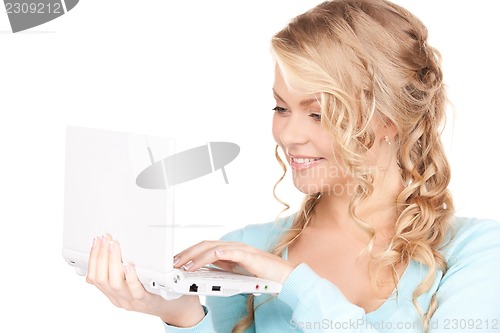 Image of happy woman with laptop computer