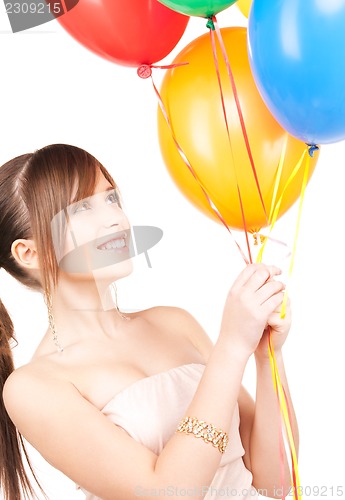 Image of happy teenage girl with balloons