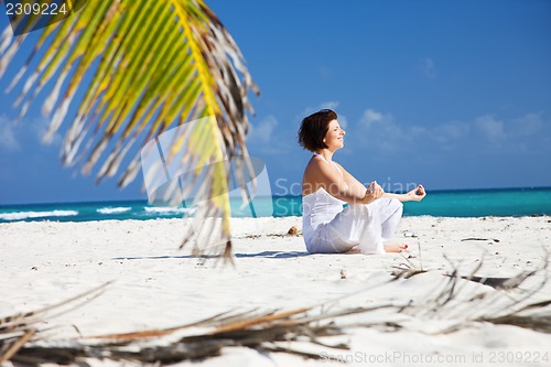 Image of meditation on the beach