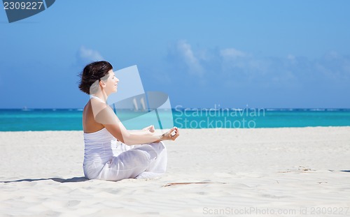 Image of meditation on the beach