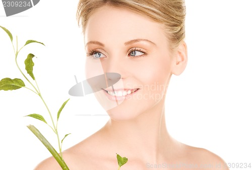 Image of woman with sprout