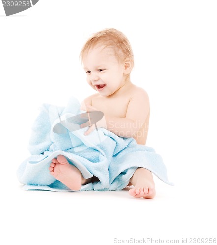 Image of baby with blue towel