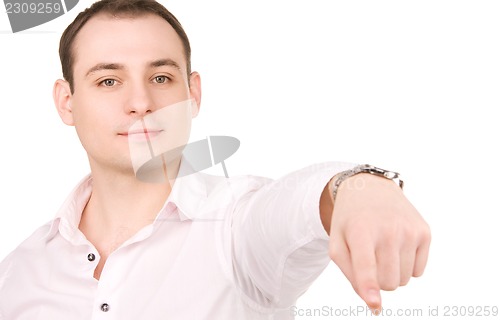 Image of businessman pointing his finger