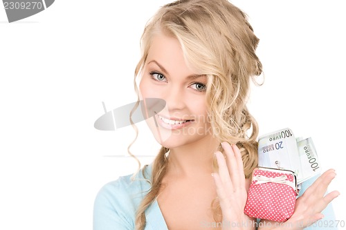 Image of lovely woman with purse and money