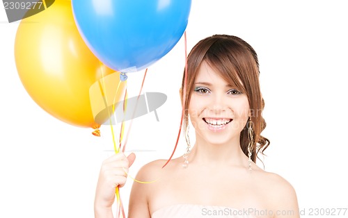 Image of happy teenage girl with balloons