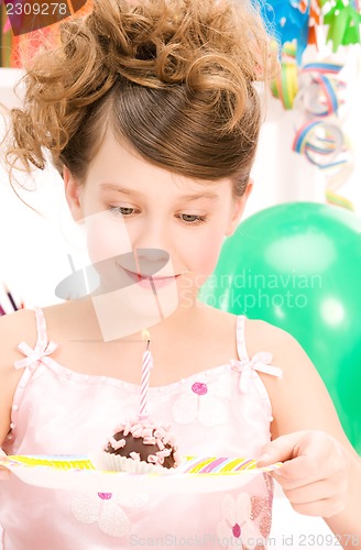 Image of party girl with cake