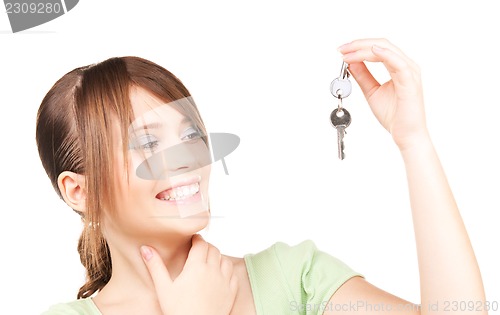 Image of happy teenage girl with keys